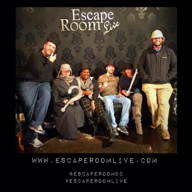 Team Disturbed Friends (Mike, Steph, Dalia, Jason and Rohan) defeated the infamous Dr. Moriarty! Photo courtesy of Escape Room Live's Facebook page.