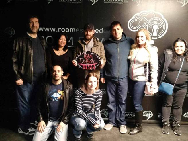 Team Disturbed Friends (Mike, Eric, Mark, Katheryn, Sibel, Jason and Cat) escaped being eternally committed to the asylum by Dr. Panic! Photo courtesy of Room Escape DC's Facebook page.