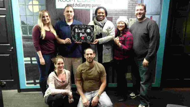 Team Disturbed Friends (Katheryn, Mark, Stephanie, Mike, Tara and Jason) solved the mystery of Molly's disappearance (we did both Horror Room and Black Death in the same night, so ignore the sign on this one). Photo courtesy of Room Escape DC's Facebook page.